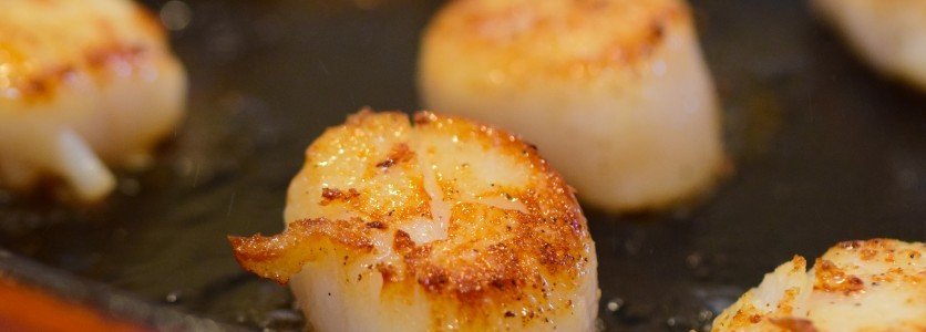 Pan-seared scallops with Hatch green chili cheese grits